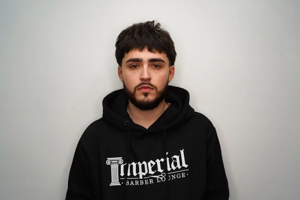 Headshot of Caleb Parker, the owner of Imperial Barber Lounge
