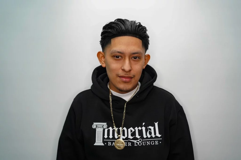 Headshot of Jr, a barber of Imperial Barber Lounge's Coon Rapids location