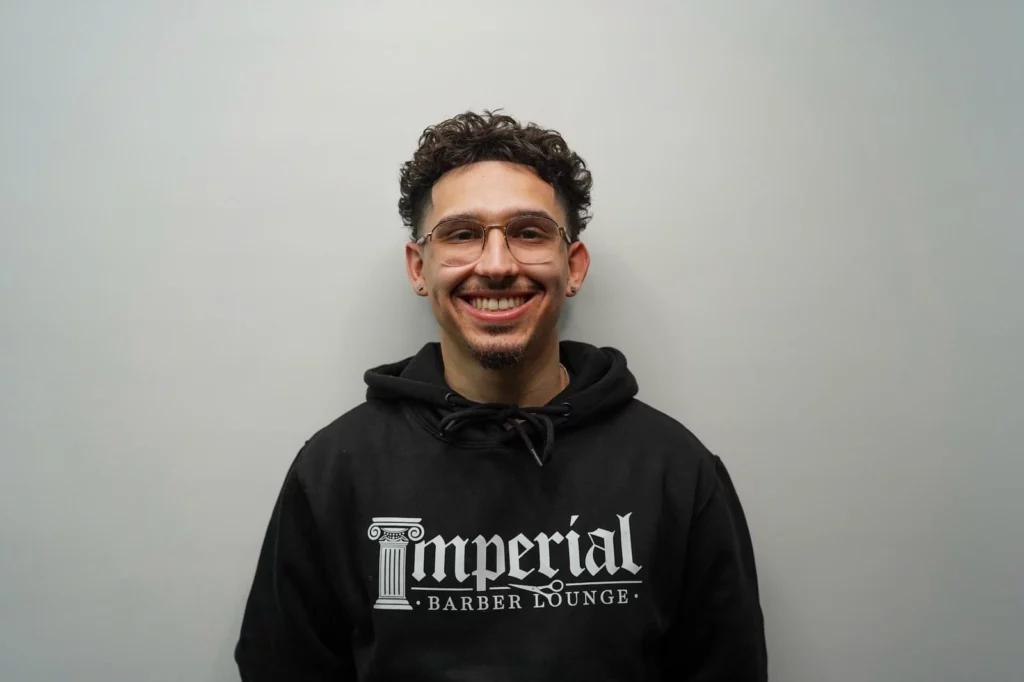 Headshot of Trey, a barber of Imperial Barber Lounge's St. Paul location