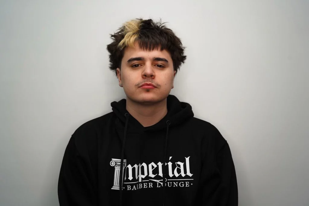 Headshot of Zack, a barber of Imperial Barber Lounge's St. Paul location