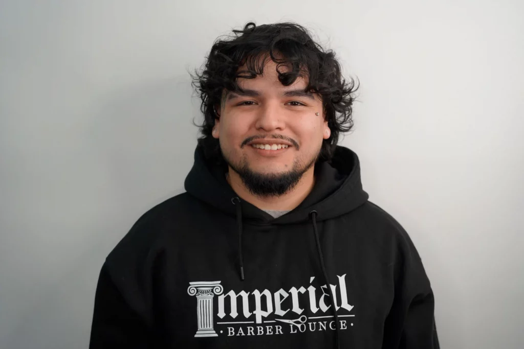 Headshot of Angel, a barber of Imperial Barber Lounge's St. Paul location