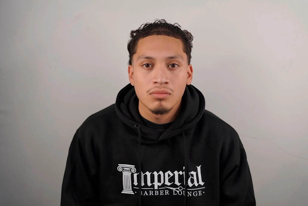 Headshot of Fernando, a barber of Imperial Barber Lounge's Saint Paul location